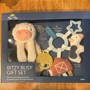 Itzy Ritzy Plush Cow Toy with Teething Accessories